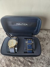 NAUTICA  gold face blue and