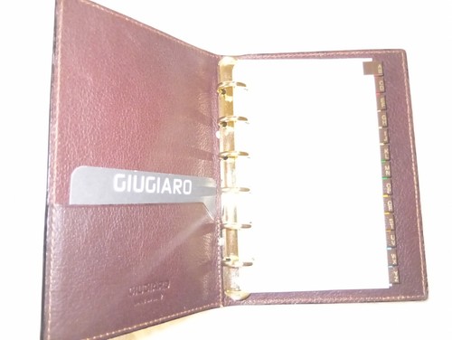 Rubrica pelle giugiaro - in,