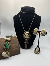 Lotto orecchini e spille