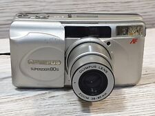 Olympus Superzoom 80g fotocamera pellicola 35mm punti. Funzionante ma difettoso.