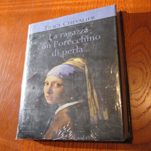 Ragazza con orecchino di - la,