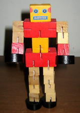 Robot in legno Transformer giocattolo snodabile e trasformabile h. 14,5 cm.