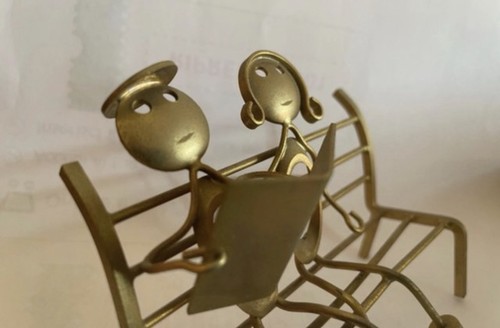 Scultura metallo ottone coppia