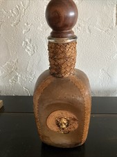 Bottiglia di vetro rivestita