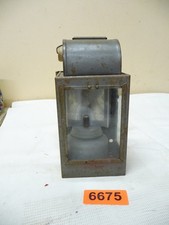 6675.     Vecchia lampada a