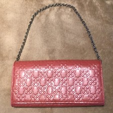 Portafoglio Coach rosa busta floreale in rilievo catena staccabile nuovo con etichetta