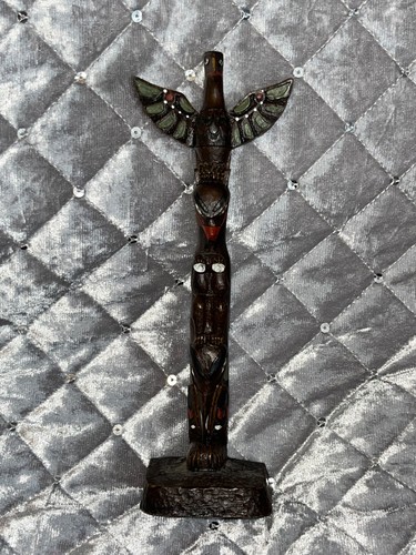 Traditional totem pole hand - traditional,