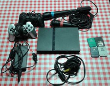 Sony PlayStation 2 SCPH-70004+16 giochi+4 memory card+2 joypad+2 microfoni 