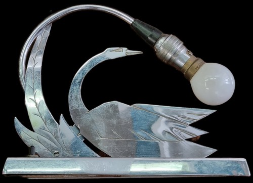 Antica lampada scultura cigno