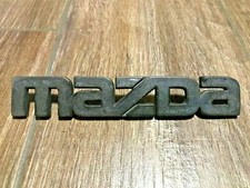 MAZDA 139MM LOGO SIGLA EMBLEMA FREGIO STEMMA SCRITTA TARGHETTA BADGE PLACCA NOME