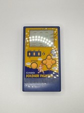 Videogioco portatile vintage 1984 Casio CG86 Soldier Fighter - SPEDIZIONE GRATUITA USA
