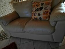 Vendo due divani nicoline colore avorio eco pelle ottomo stato, il  due posti...