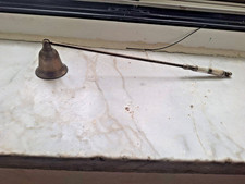 spegni candela antico