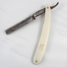 Antico coltello da barbiere