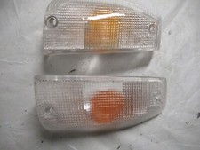 Autobianchi Y10 II serie - Coppia plastiche fanalini anteriori  - Ricambio nuovo