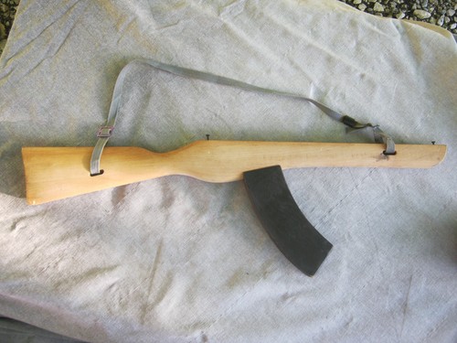 Peu courrant arme bois - courrant, en