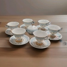 Tea Cups With Plates And Sugar