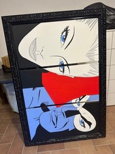 quadro moderno Diabolik rosso bianco nero e azzurro con cornice artigianale