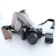 Corpo fotocamera Olympus OM101 35mm pellicola reflex messa a fuoco manuale vento automatico vintage testata