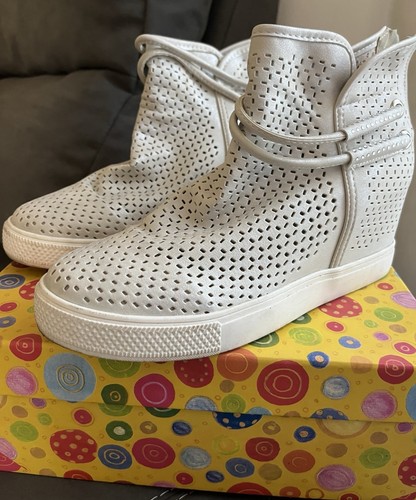 Scarpe con rialzo interno
