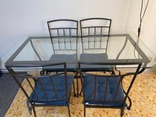 Tavolo In Cristallo E Ferro Battuto e 4 sedie in ferro battutto