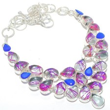 Quarzo rutilato rosa, onice