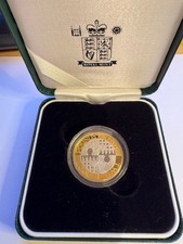 2 monete: argento e oro Regno Unito £ 2 Act of Union moneta commerciale e 1967 1p placcato oro