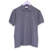 Polo Lacoste grigia tinta
