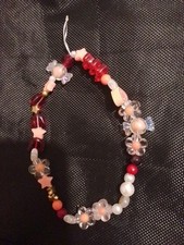 Charn telefono con perline