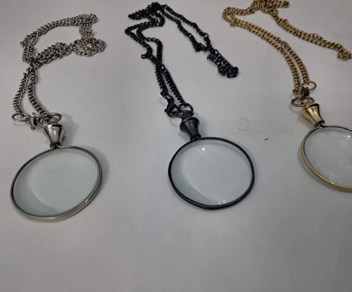 Collana con lente - , di