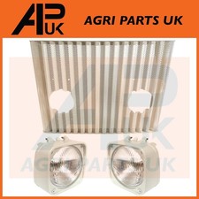 Griglia e fari per trattore