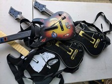 Lot Of 4 Guitar Hero Guitars
