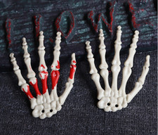 Mano scheletro con - con, sangue