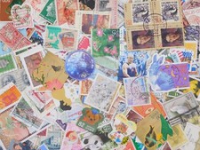 FRANCOBOLLO WORLD WIDE 10000pz lotto fuori carta kiloware collezione usato co...