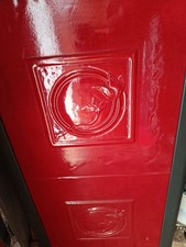 Stufa a legna in ghisa e ceramica usata