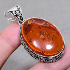 Ciondolo giallo ambra forma ovale pietra preziosa fatto a mano moda vintage...