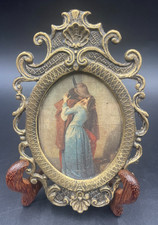 Quadro miniatura ovale BACIO stampa sul seta cornice ottone