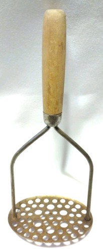 Antico schiacciapatate vintage