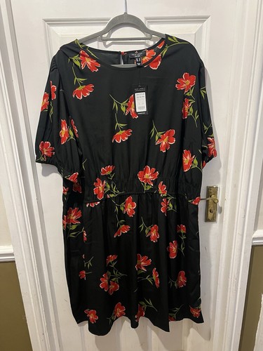 Abito nero floreale smock