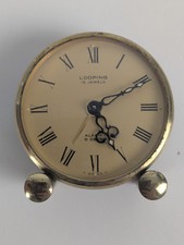 Miniature Looping Alarm Clock, 15 Jewels, 8 Days, Brass.