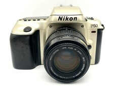 Nikon F50 + Sigma 70-210 mm