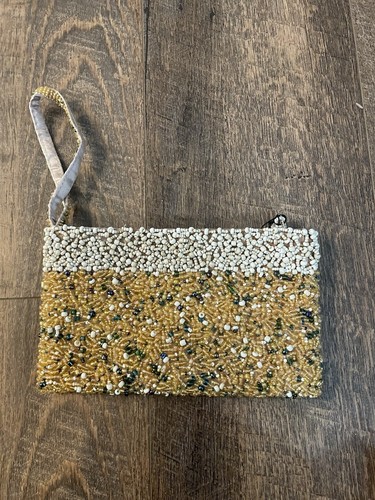 Pochette pochette oro bianco