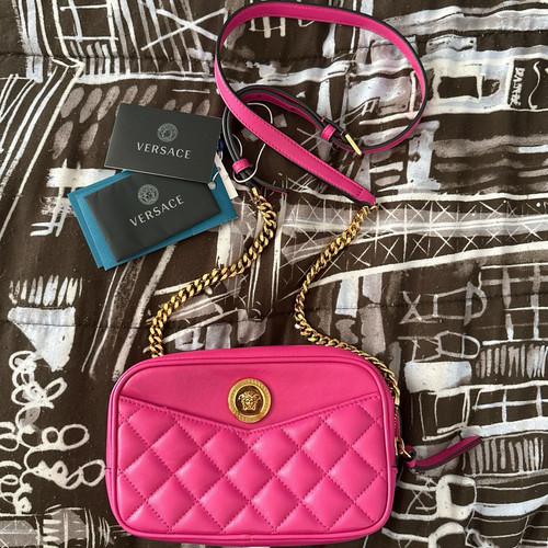 Versace rosa trapuntato logo