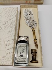 penna  con piuma bianca e
