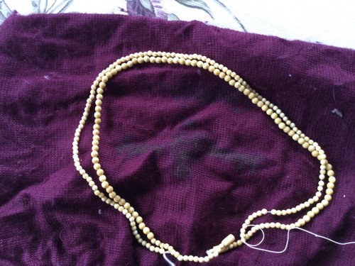 Collana tipo avorio perline - 2.,