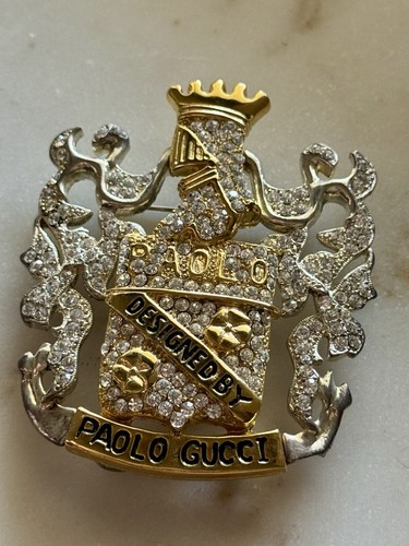 Spilla scudo paolo gucci - paolo,