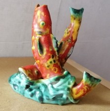 Statua di pesci in ceramica -