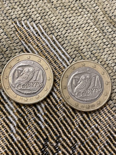 Monete euro con gufo - da,