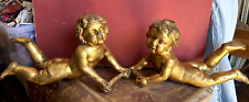 Antica coppia di putti, angeli, amorini, in legno del XIX secolo in foglia oro