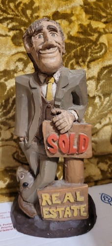 Figurina agente immobiliare